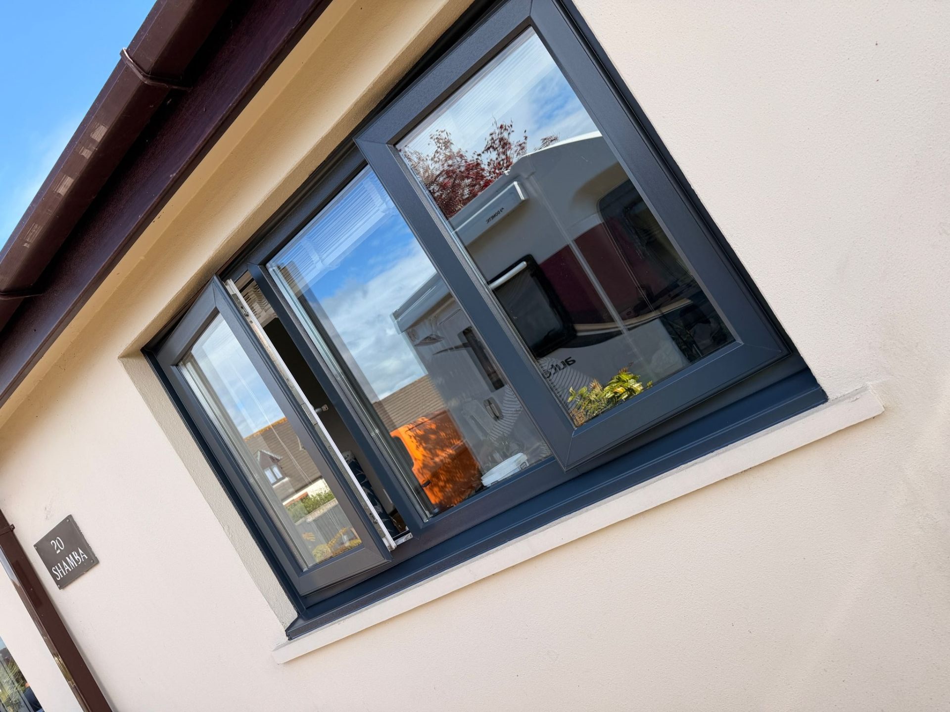 Anthracite grey UPVC window after professional respray
